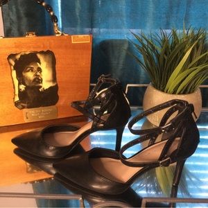 Black ankle strap pumps, 3 inch heel. Worn 3-4 times. Great condition.